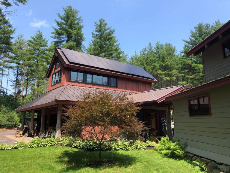 Roof mounted solar pv on red house